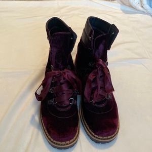 Velvet burgundy boots with satin laces.